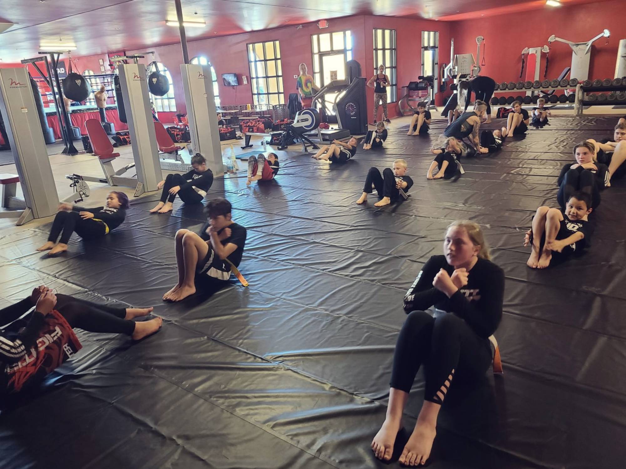 Coach supervision on mats